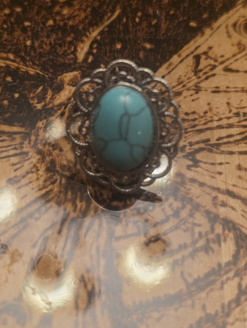 Turqoise Gemstone Set In Adjustable Silver Tone Bezel Ring Frame